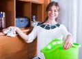 Woman cleaning in living room Royalty Free Stock Photo