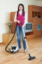 Woman cleaning living room Royalty Free Stock Photo