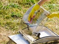 Woman cleaning old caravan sunroof