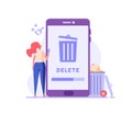 Woman cleaning phone, smartphone with trash can sign. User removing files or documents to waste bin. Concept of delete file,