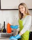 Woman cleaning pipe with detergent Royalty Free Stock Photo