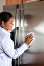 Woman Cleaning Refrigerator