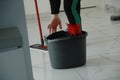 Woman cleaning tiles home. House disinfection