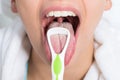 Woman Cleaning Tongue Royalty Free Stock Photo
