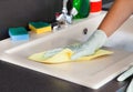 Woman Cleaning Worktop