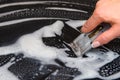 A woman cleans the electronic ceramic hob Royalty Free Stock Photo