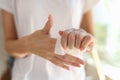 Woman cleans her hands close-up. Hand skin care.