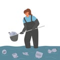 A woman cleans the river from debris. Nature protection volunteers at work. Activist cleans water from plastic waste. Pollution