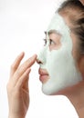 Woman with cleansing mud mask