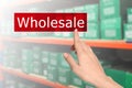 Woman clicking Wholesale button and view of warehouse on background