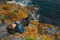 Woman on a cliff Royalty Free Stock Photo