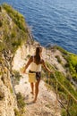 Woman on cliff of Zakynthos island - Agalas, Greece Royalty Free Stock Photo