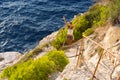 Woman on cliff of Zakynthos island - Agalas, Greece Royalty Free Stock Photo