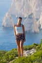 Woman on cliff of Zakynthos island - Agalas, Greece Royalty Free Stock Photo