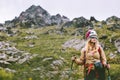 Woman climber hiking at rocky mountains Royalty Free Stock Photo