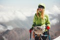 Woman climbing on mountain summit Travel Lifestyle Royalty Free Stock Photo