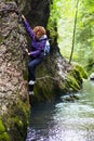 Woman climbing on a mountain wall