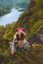 Woman climbing in Norway mountains travel adventure vacations Royalty Free Stock Photo