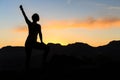 Woman climbing success silhouette in mountains sunset Royalty Free Stock Photo