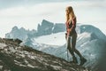 Woman climbing to mountain summit Royalty Free Stock Photo