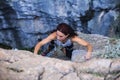 A woman is climbing in Turkey, Overcoming the fear of heights, Climbing effort Royalty Free Stock Photo