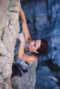 A woman is climbing in Turkey, Overcoming the fear of heights, Climbing effort Royalty Free Stock Photo