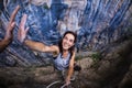 Emotional girl gives five to a friend, A woman is climbing in Turkey, Overcoming the fear of heights Royalty Free Stock Photo