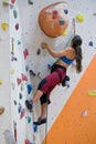 Woman on climbing wall