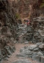 Woman Climbs Down Rocky Dry Fall in Big Bend