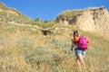 A woman climbs the hill Royalty Free Stock Photo