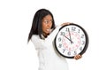 Woman with clock anxious, pressured by lack of time Royalty Free Stock Photo