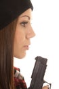 Woman close blow on end of gun side Royalty Free Stock Photo