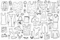 Woman clothes and accessories set in doodle style.