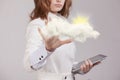 Woman with cloud and sun. Concept on the topic of computer cloud services. Royalty Free Stock Photo
