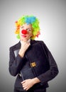 Woman clown in business suit