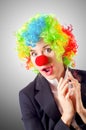 Woman clown in business suit