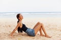 nature woman sea beach freedom sitting travel smile vacation sand female Royalty Free Stock Photo