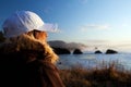 Woman at coast overlooking ocean Royalty Free Stock Photo