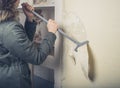 Woman in coast stripping wallpaper Royalty Free Stock Photo