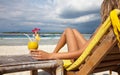 Woman with a cocktail on beach Royalty Free Stock Photo