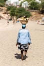 Woman with coconuts in Tarrafal, Santiago Island, Cabo Verde Royalty Free Stock Photo