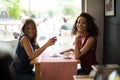 Woman at coffe shop table Royalty Free Stock Photo