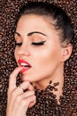 Woman in the coffee beans Royalty Free Stock Photo