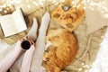 Woman with coffee and red cat sleeping in bed Royalty Free Stock Photo
