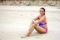 Woman and color bikini hapy relax on beach