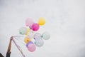 Woman with colorful balloons outside blue sky. Royalty Free Stock Photo