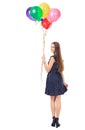 Woman with colorful balloons turning around Royalty Free Stock Photo