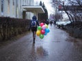 Woman with colorful balloons