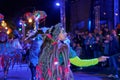 Woman with colorful fancy costume at night