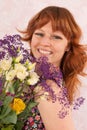 Woman with colorful flowers Royalty Free Stock Photo